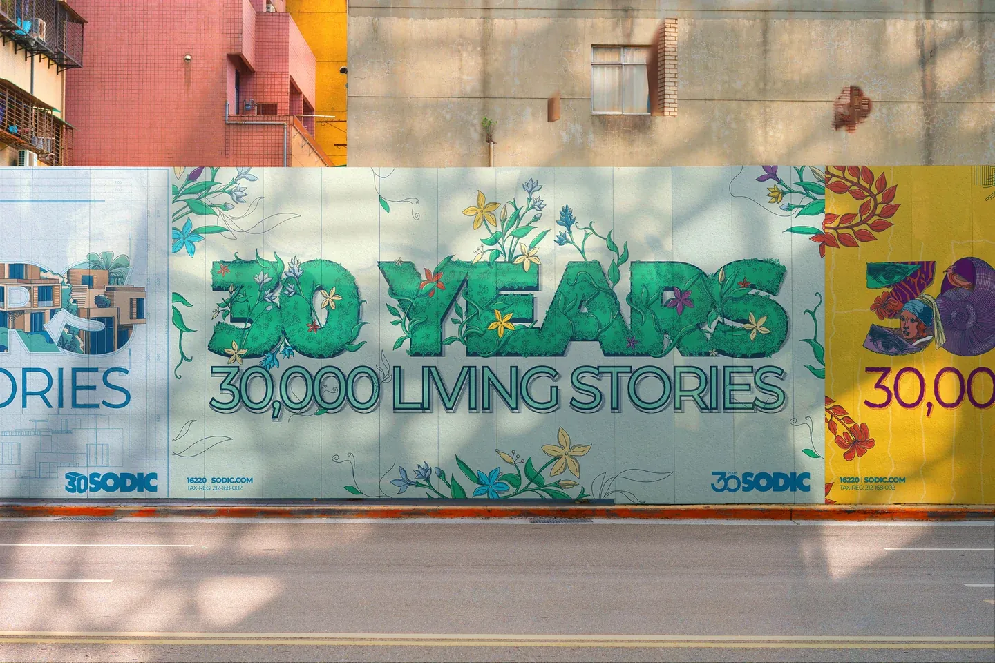 SODIC nature anniversary artwork centered between architecture and art posters along a street