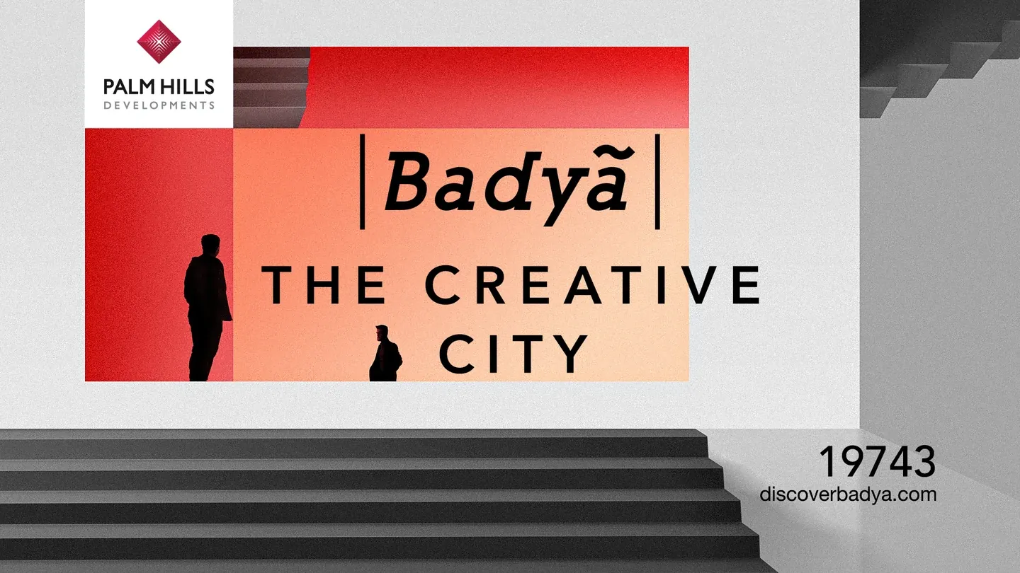 Palm Hills Badya The Creative City artwork with red architectural panels and broad steps