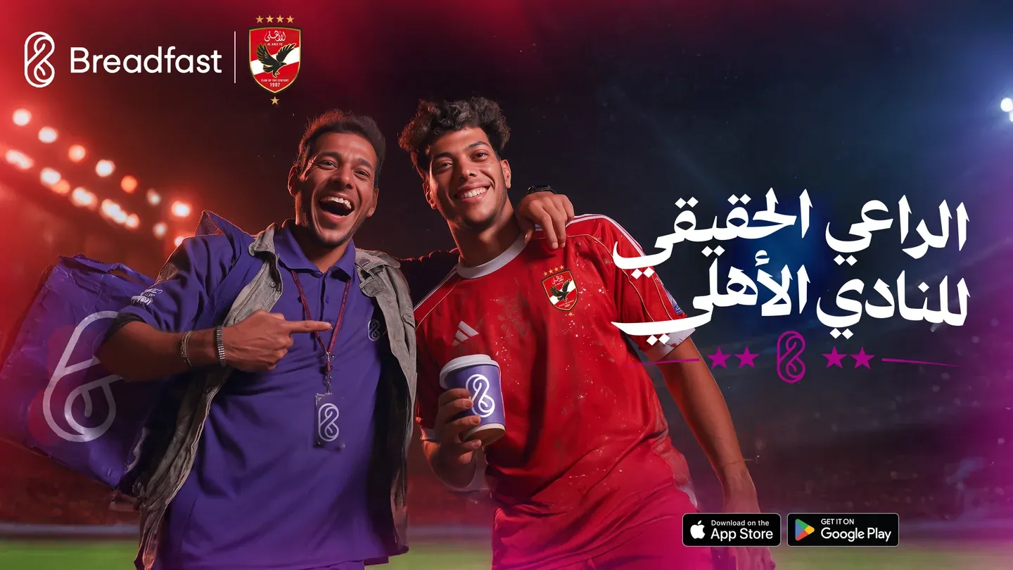 Breadfast football-sponsorship artwork with two smiling men in purple and red sportswear
